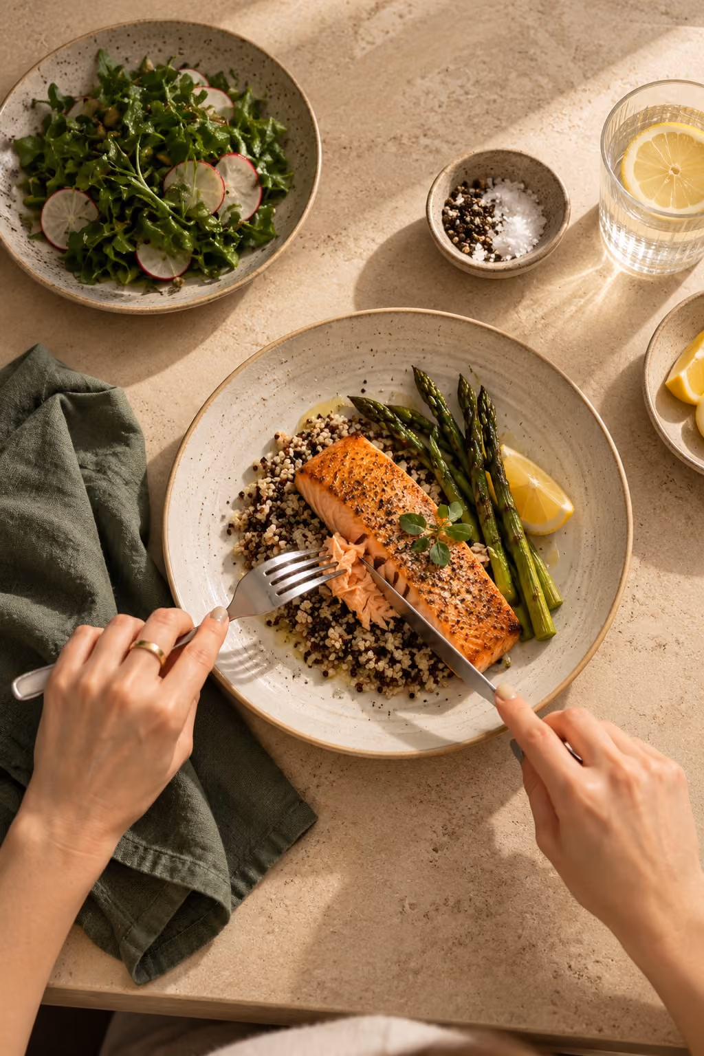 Salmon served with grains and asparagus